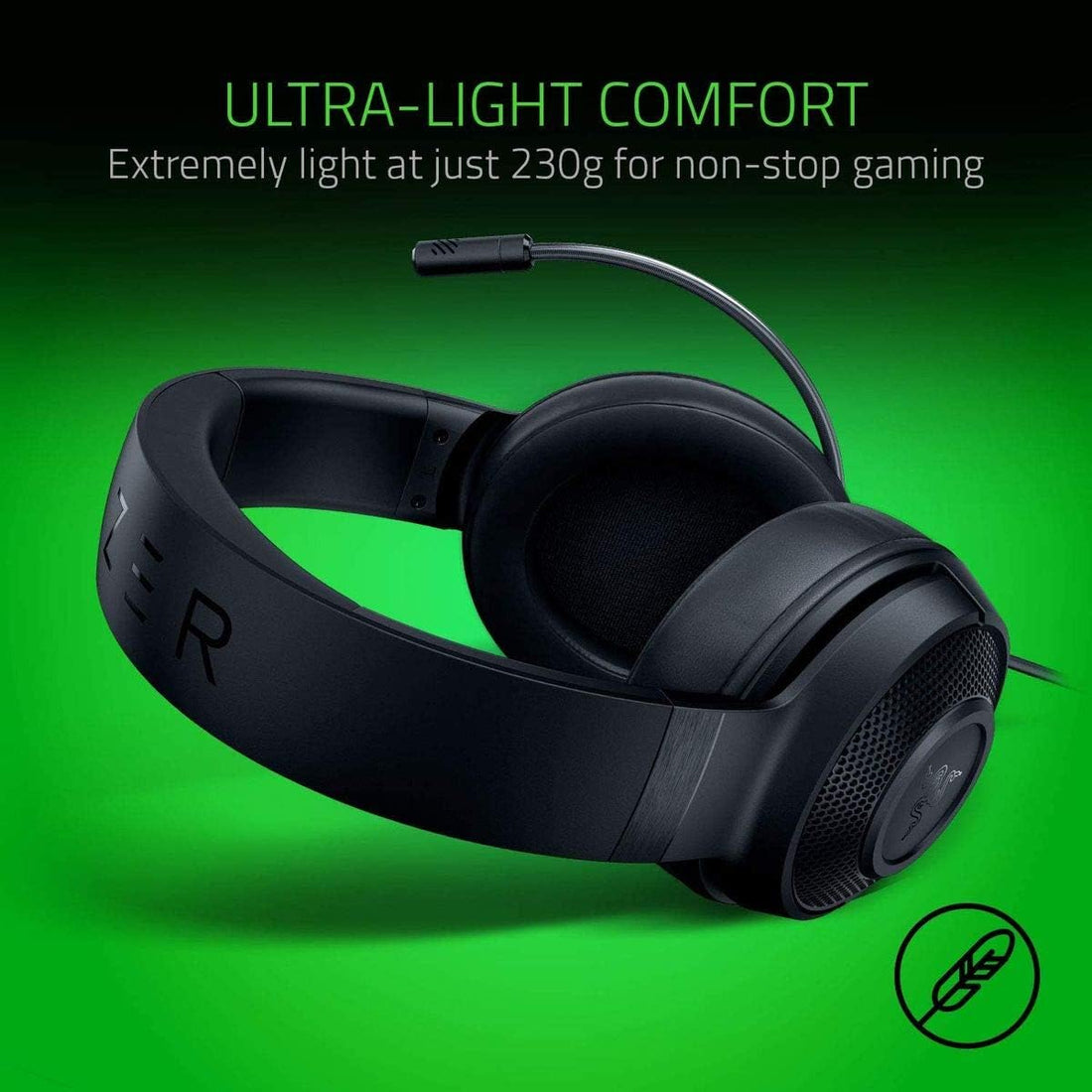Black gaming headset with microphone on a green background, highlighting ultra-light comfort feature.
