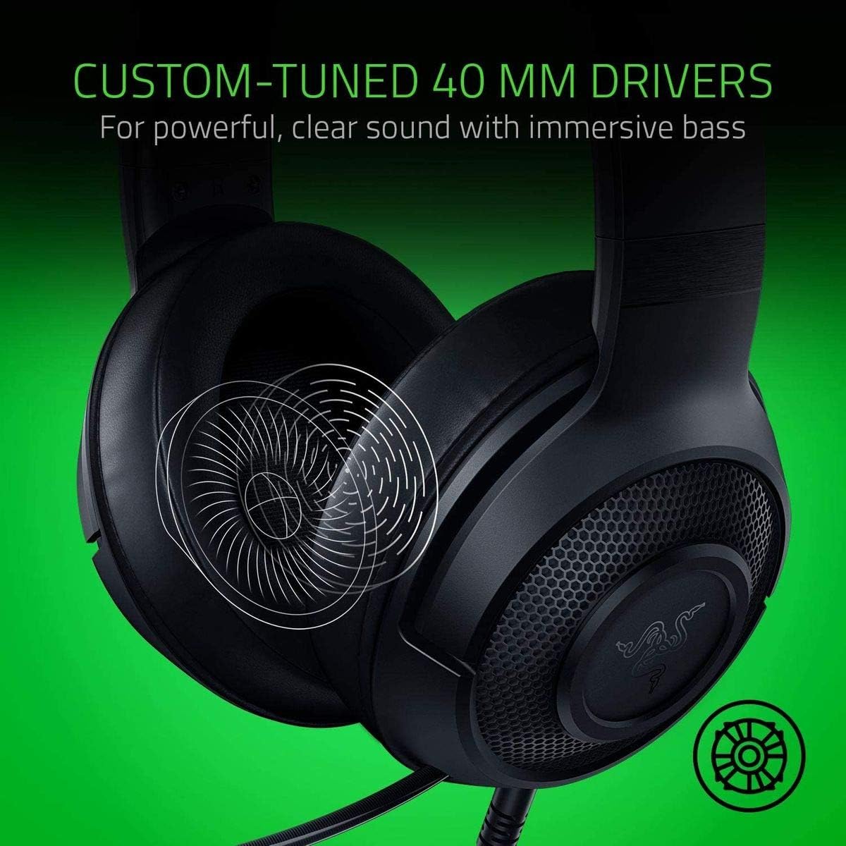 Black headphones with a close-up of a driver on a green background, featuring text about custom-tuned drivers.